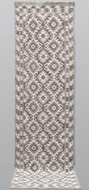 A runner, kilim, ca 298 x 84 cm.