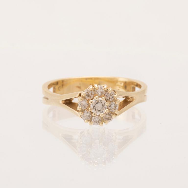 An 18K yellow gold Carmosé ring set with round brilliant-cut diamonds.