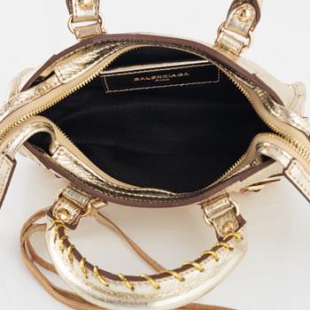 Balenciaga, a gold leather 'Classic City Mini Bag'.