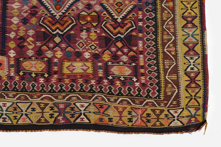 An antique kilim, southeastern Anatolia/Caucasus, c. 398 x 176 cm.