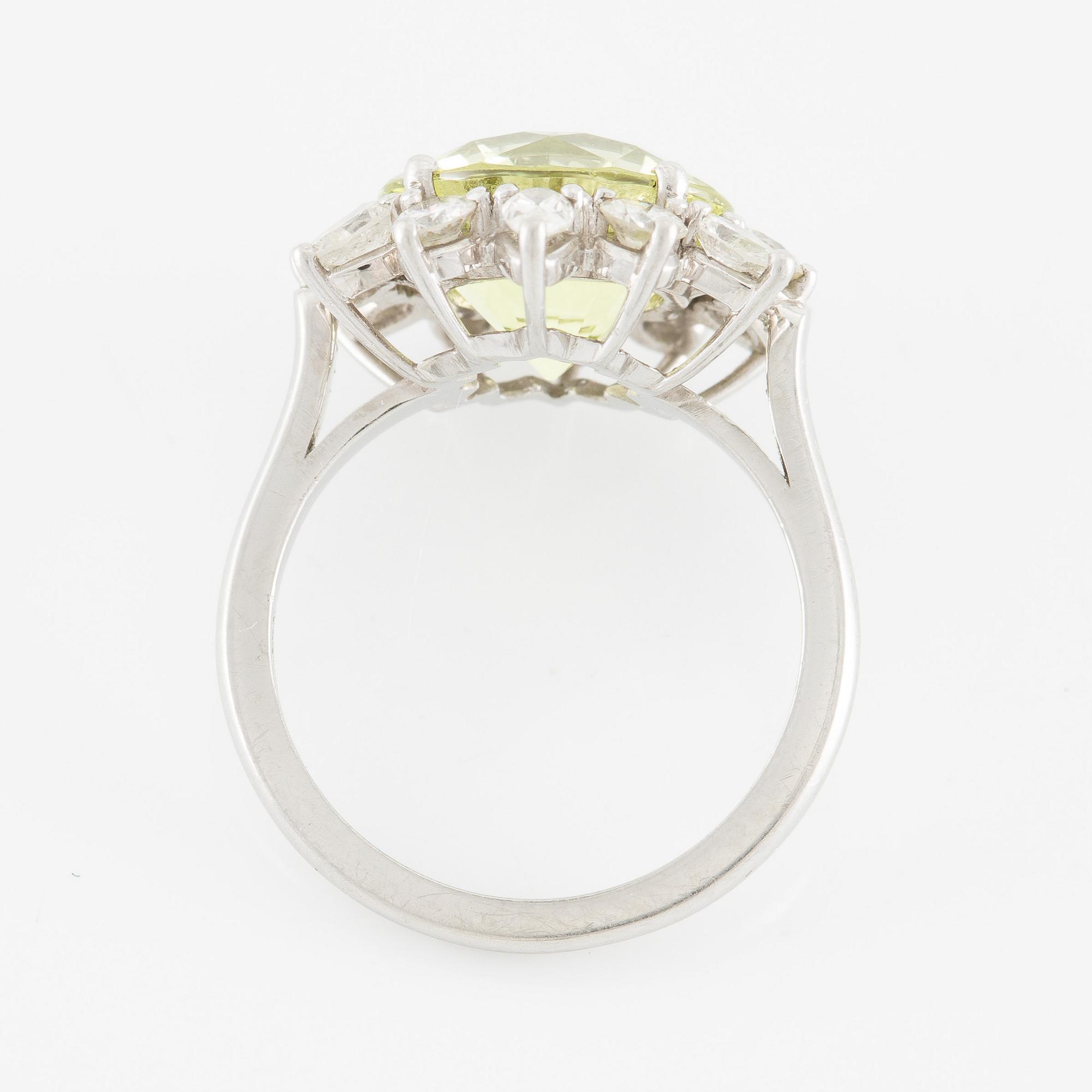 Ring, in the form of a flower, platinum with chrysoberyl and drop-cut and brilliant-cut diamonds.