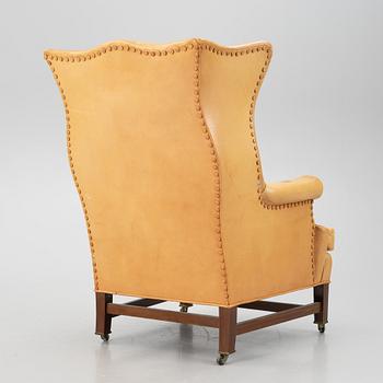 Öronlappsfåtölj, 1900-talet.