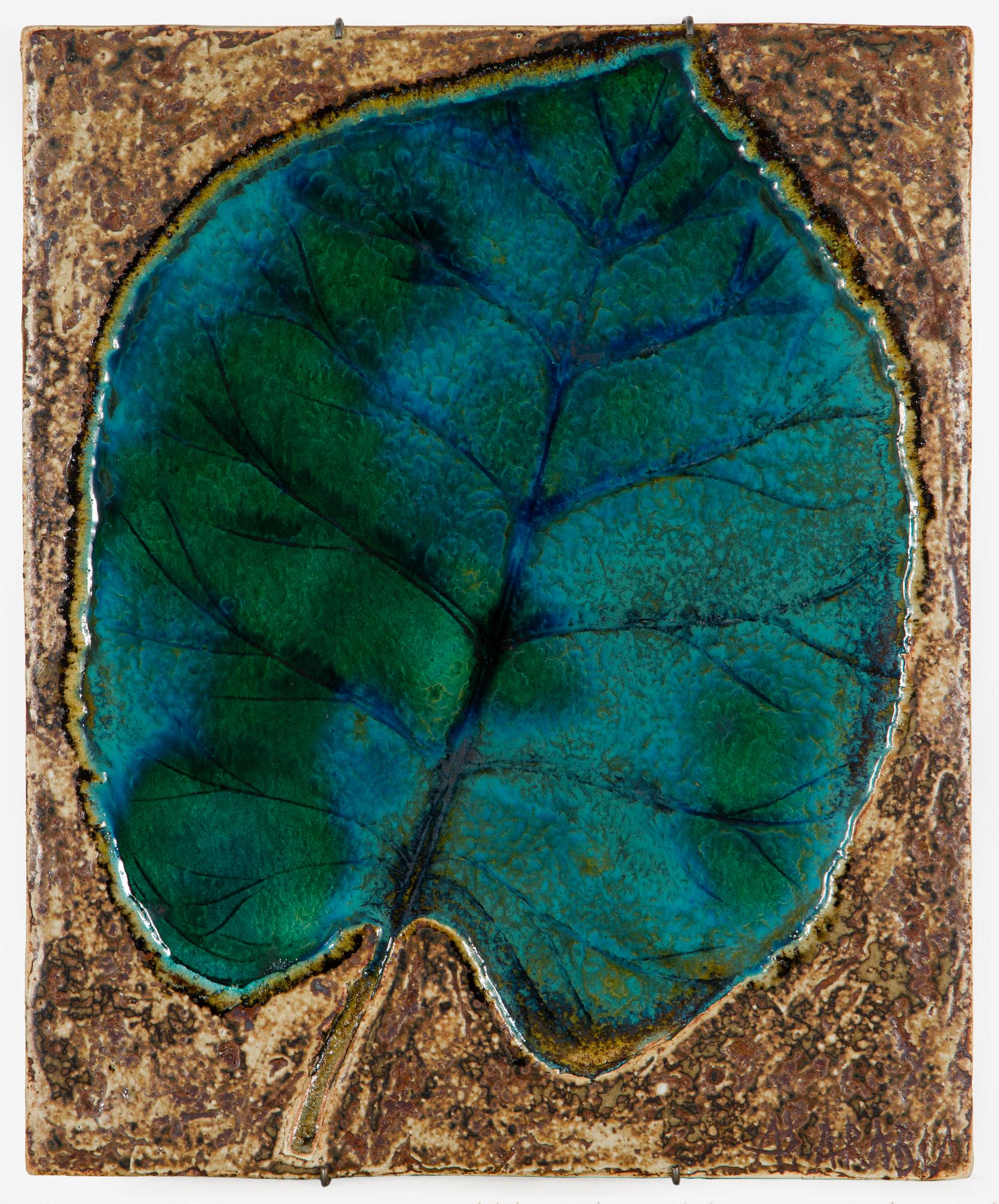 Annikki Hovisaari, a stoneware relief, signed AH ARABIA.