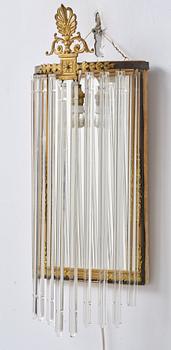 A pair of mirror sconces, 1910's/20's.