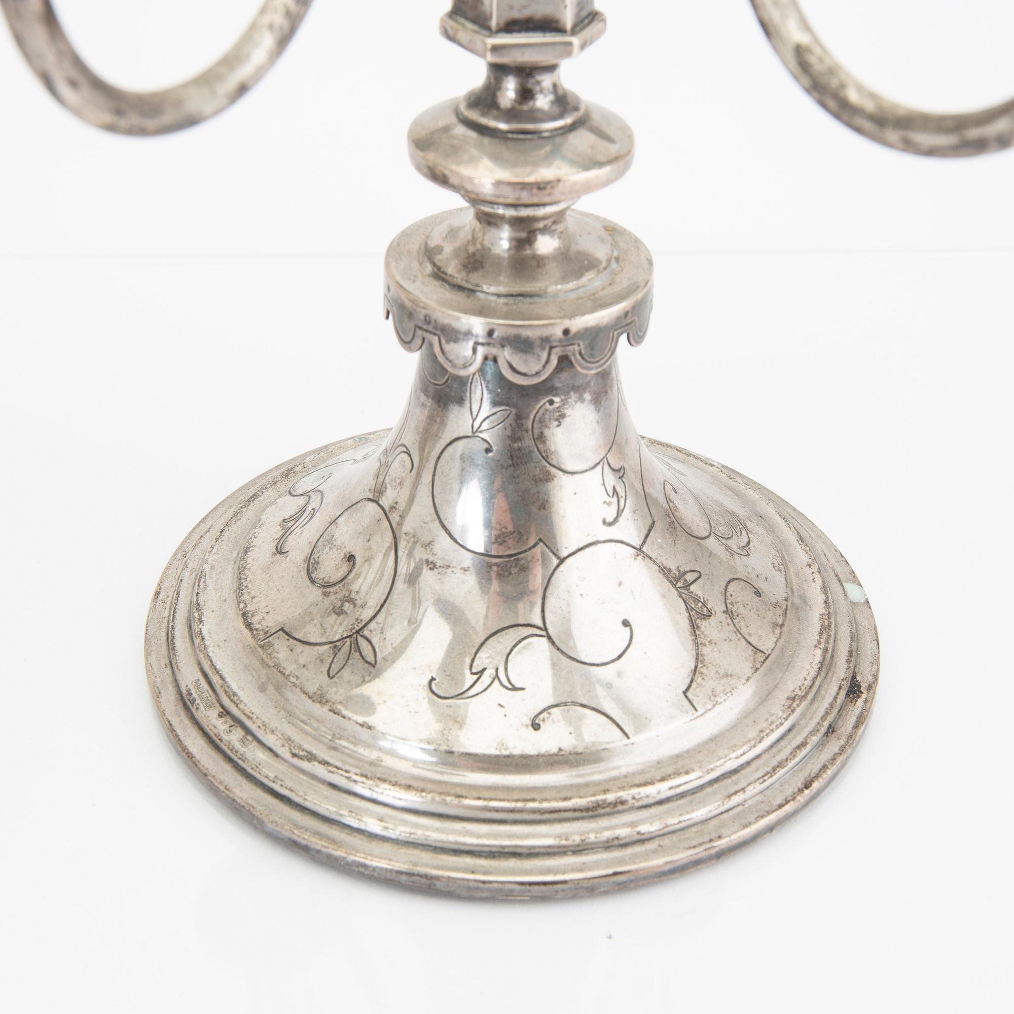 A Swedish 20th century pair of silver candelabras mark of CG Hallberg Stockholm 1928 possibly Elis Bergh.
