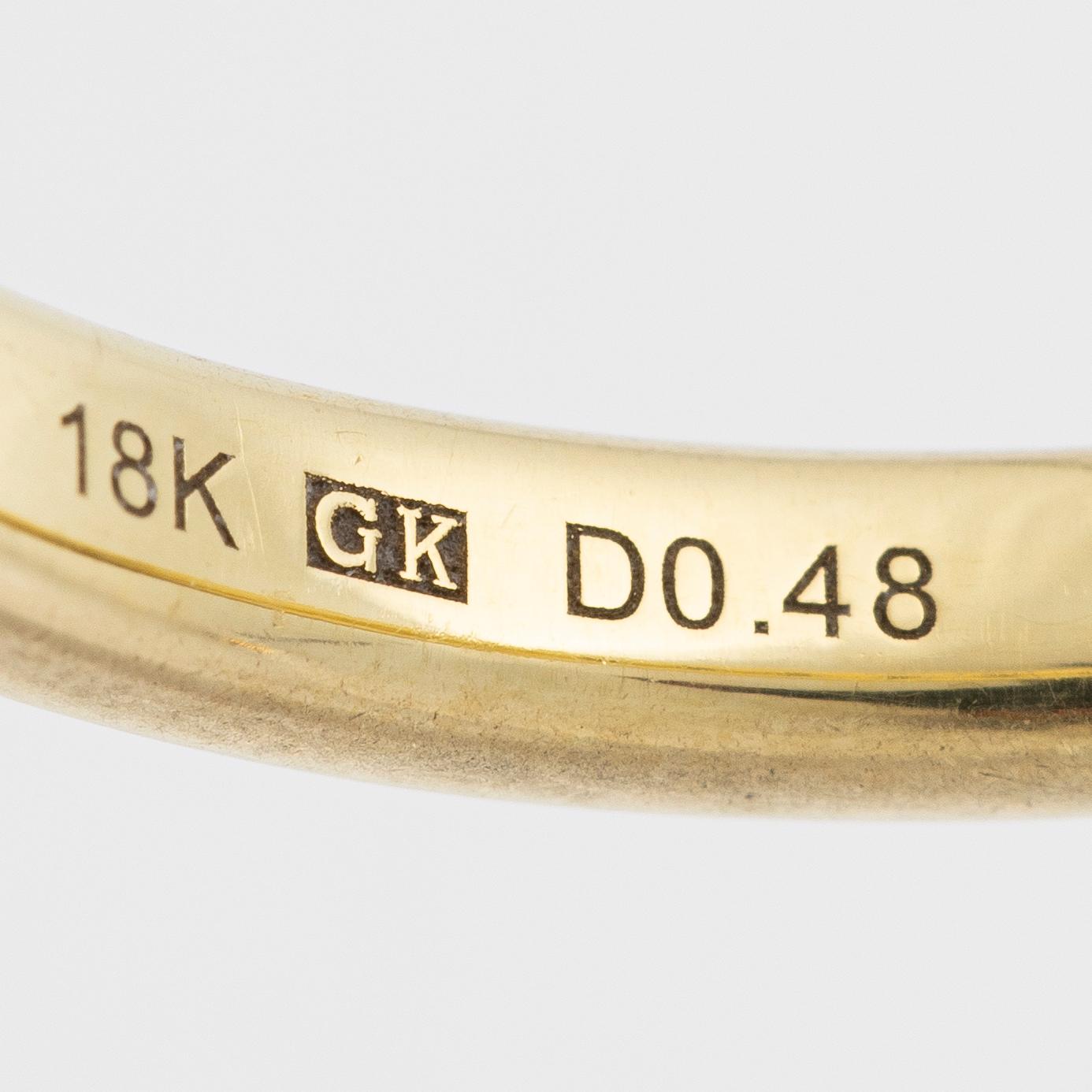 Ring, 18K gold with brilliant-cut diamonds.