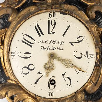 A Rococo wall clock, second half of the 18th Century.