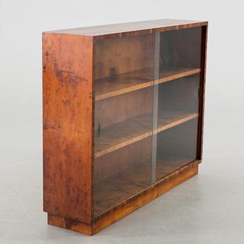 A 20Th CENTURY BOOKCASE.