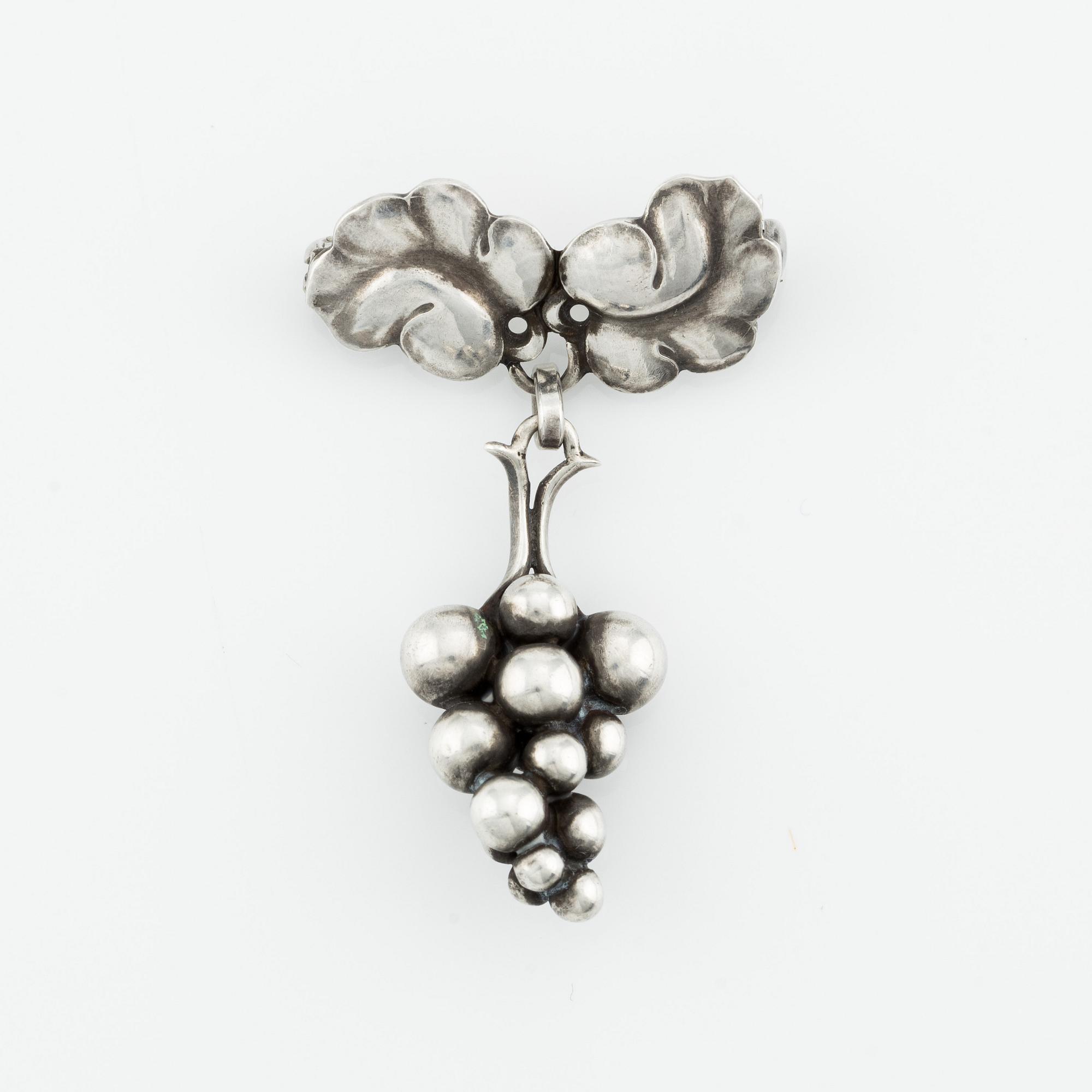 Harald Nielsen, a sterling silver necklace, a brooch, and a pair of earrings, for Georg Jensen, Denmark post 1945.