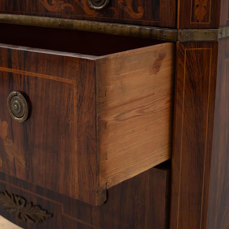A Gustavian style chest of drawers, early 20th century.