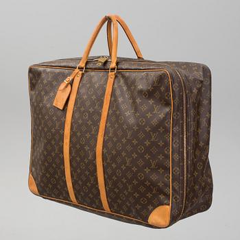 LOUIS VUITTON, a 'Sirius 65' monogram canvas suitcase.