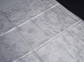 A tea table cloth, linen damask, "Lilla blomsterkorgen", ca 143,5 x 144 cm.