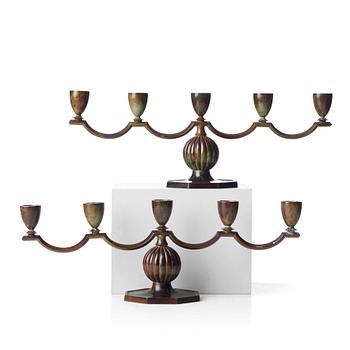 244. GULDSMEDSAKTIEBOLAGET (GAB), a pair of Swedish Grace patinated bronze candelabra, Stockholm 1930's.