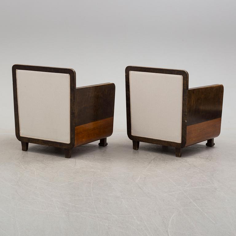 A pair of 1930´s art déco easy chairs.