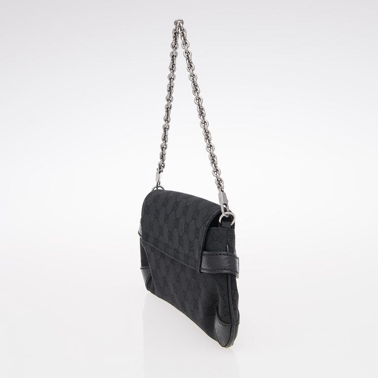 A Black GG Canvas Horsebit Clutch.