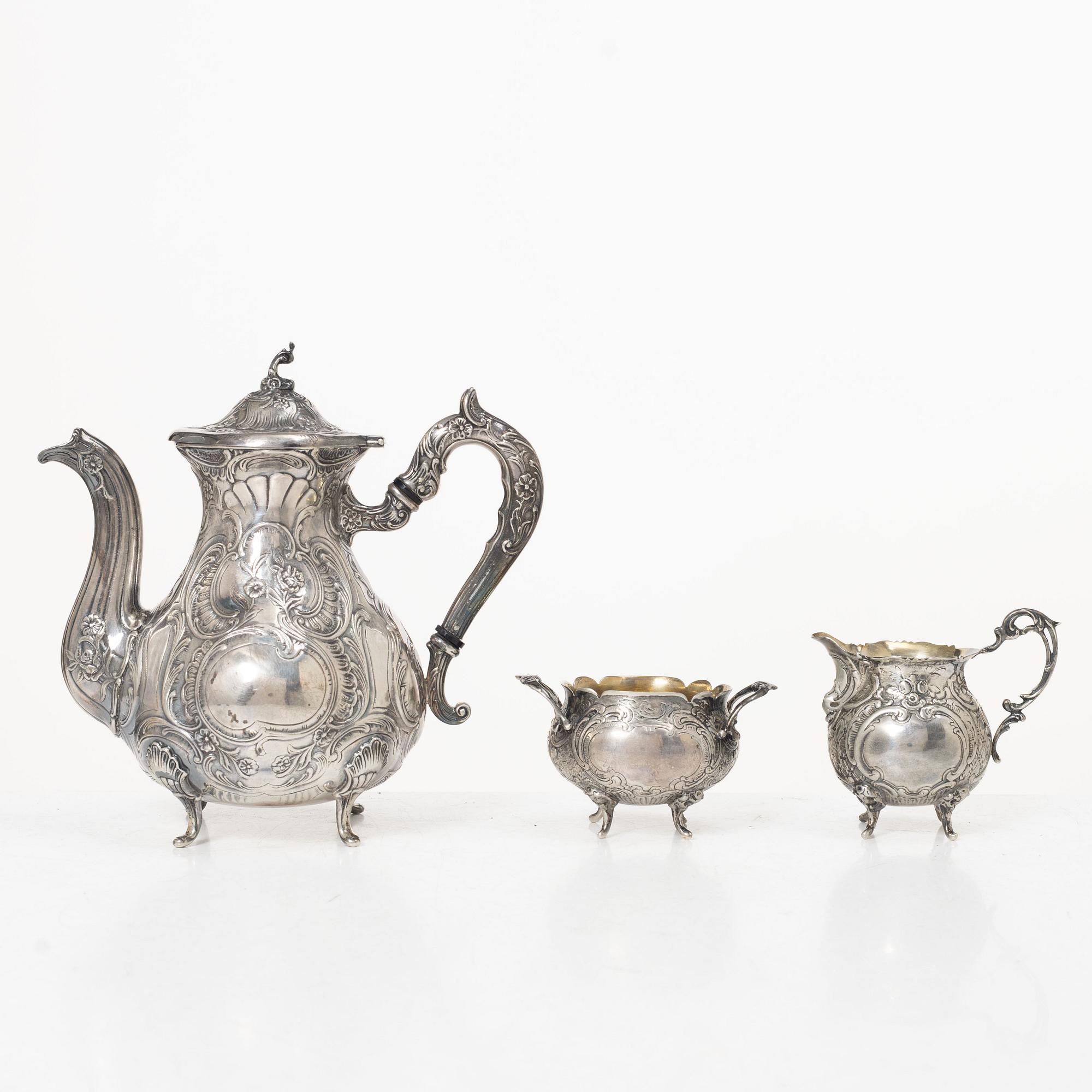 Georg Wessfelt, A Rococo style three piece silver coffee service, Malmö 1959 and 1965.