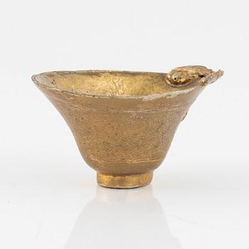 A gilt bronze libation cup, China, presumably 20th Century.