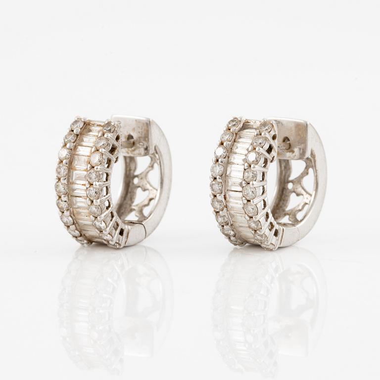 Earrings, a pair, 18K white gold set with baguette and brilliant-cut diamonds.