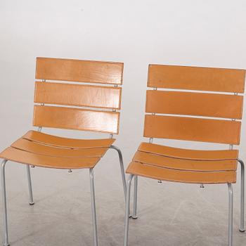 A set of four leather and metall chairs from Fasem, Italy, likely Giancarlo Vegni.