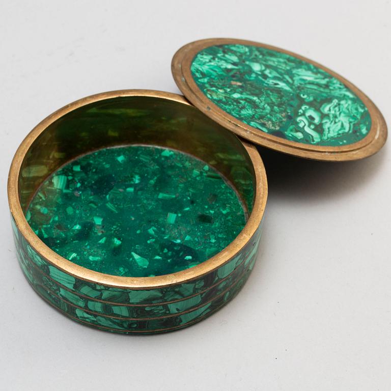 An early 20th century malachite and brass box.