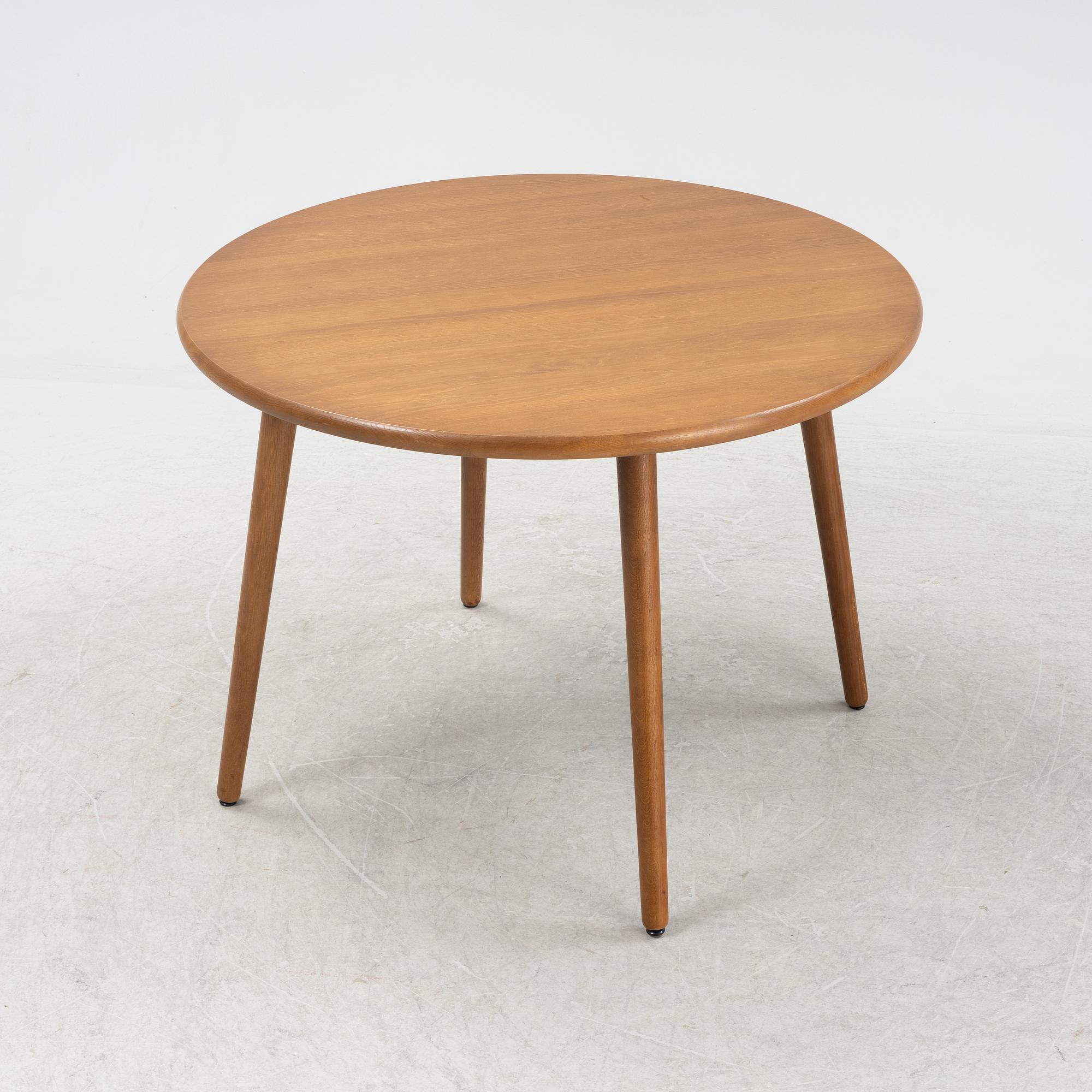 Jonas Lindvall, a stained oak dining table for Stolab.