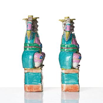 A pair of famille rose candlesticks, Qing dynasty, Qianlong (1736-95).
