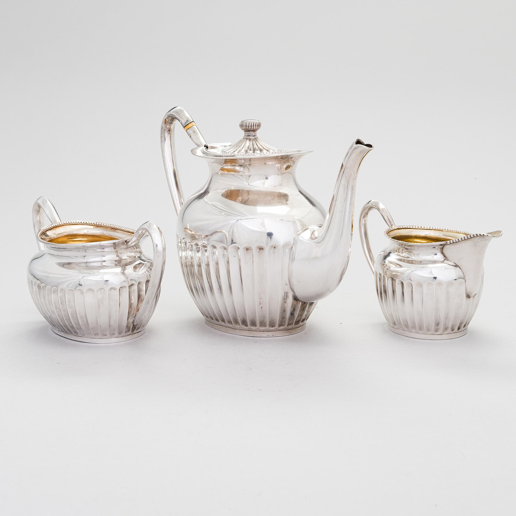 A three-piece gadrooned silver coffee set, Helsinki and Turku 1911 and 1914.