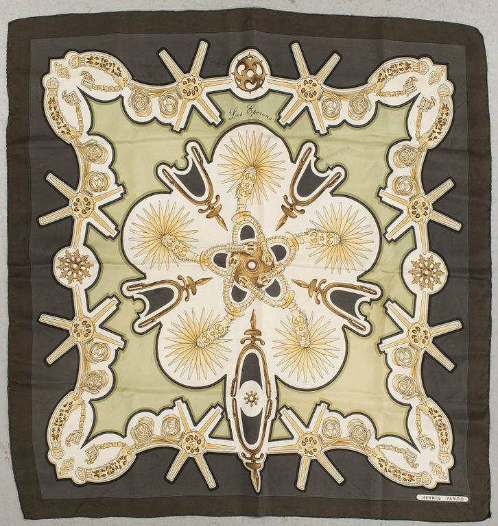 A "Les Eperons" silk scarf by Hermès.