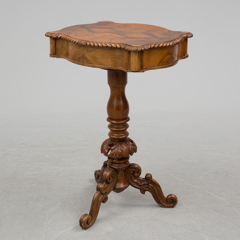 A mid 19th century sewing table.