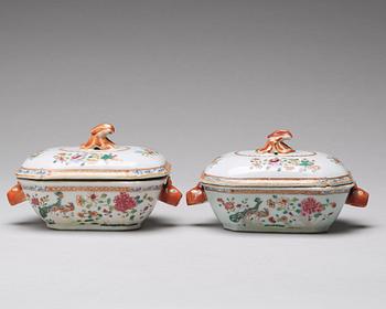 A pair of famille rose 'double peacock' butter tureens with cover and stand, Qing dynasty, Qianlong (1736-95).