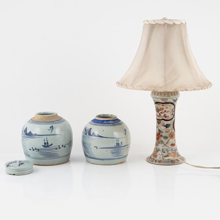 A Japanese vase made in to a lamp, and two Chinese blue and white jars, 19th Century.