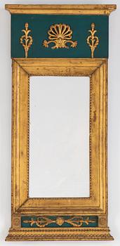 An Empire mirror, first half of the 19th century.