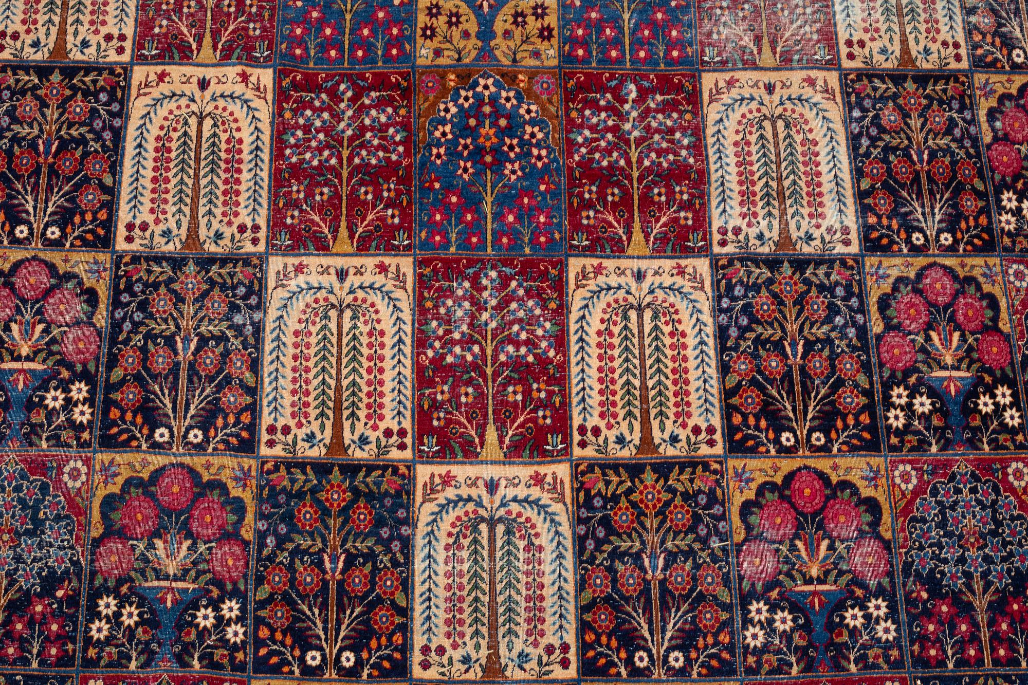 A carpet, an antique/a semi-antique Yezd, ca 557-562 x 366,5-370,5 cm.