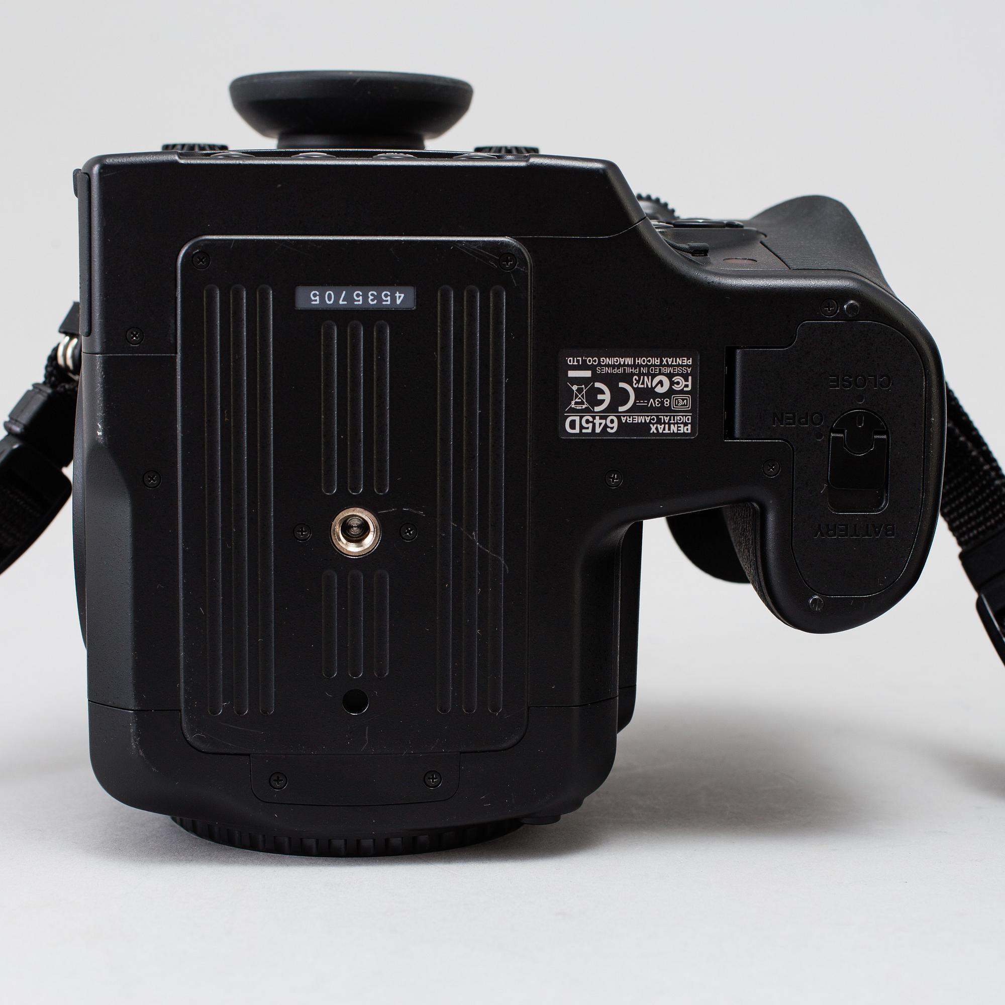 A black body medium format Pentax 645D camera with a SMC Pentax-D FA 645 55mm F2.8 AL [IF] SDM AW lens.