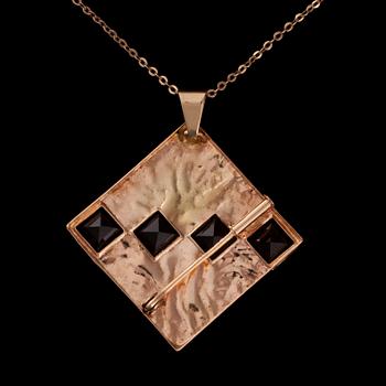 HÄNGE / BROSCH, 14K guld och rökkvarts. Vikt ca 5,9 g.