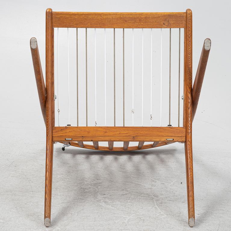 Folke Ohlsson, a pair of oak Frisco easy chairs, Nodafors, 1960s.