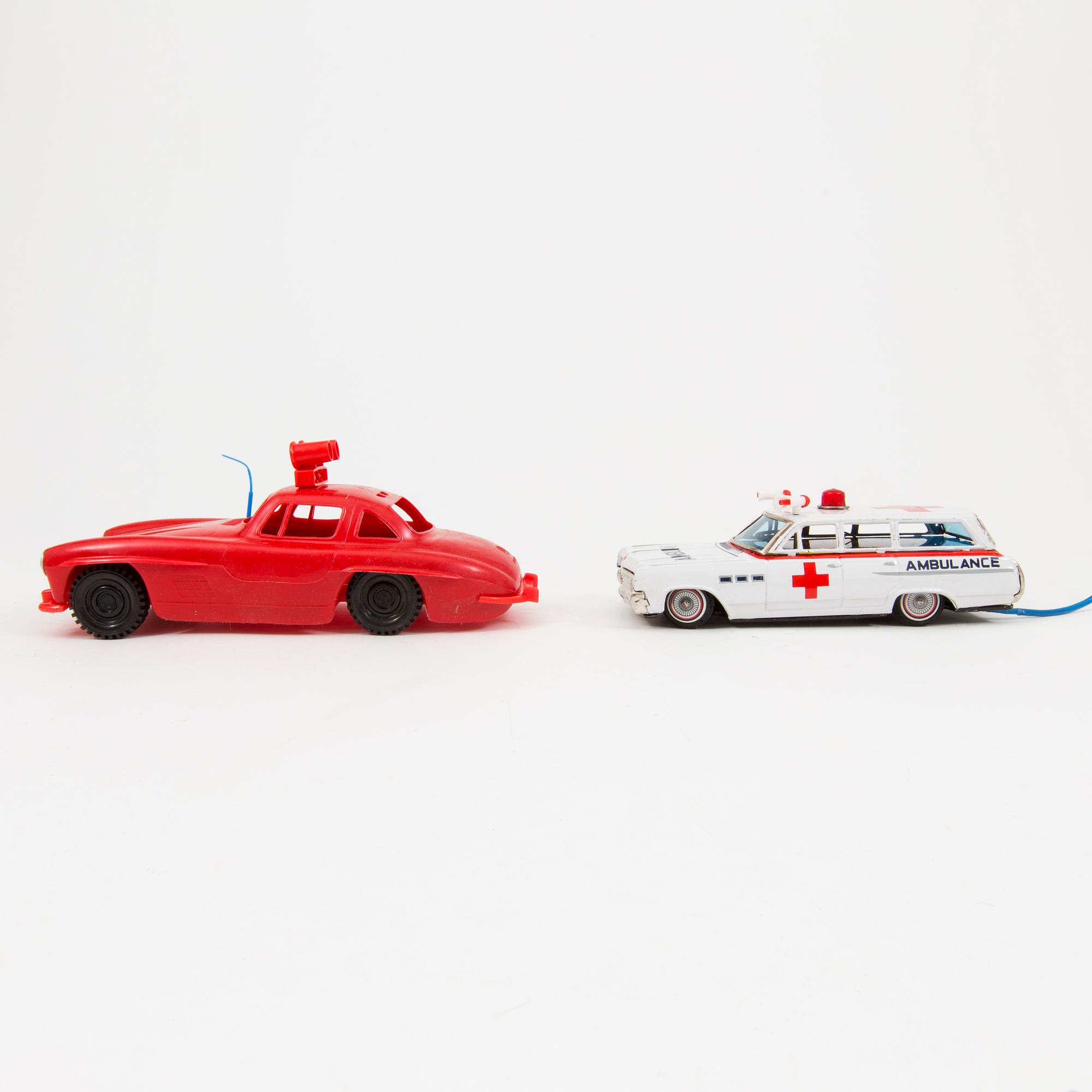 Two toy cars Germany and England 1960s.