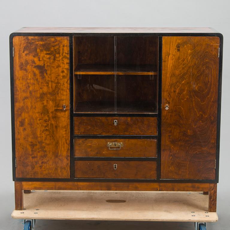 A 1930s functionalist style cabinet.