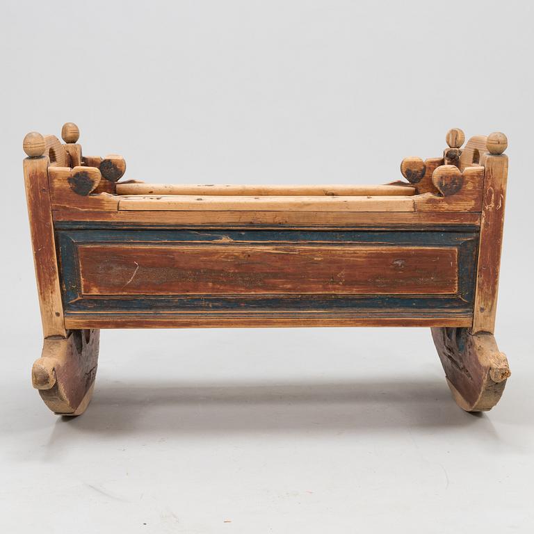 A cradle dated 18.9 1845.