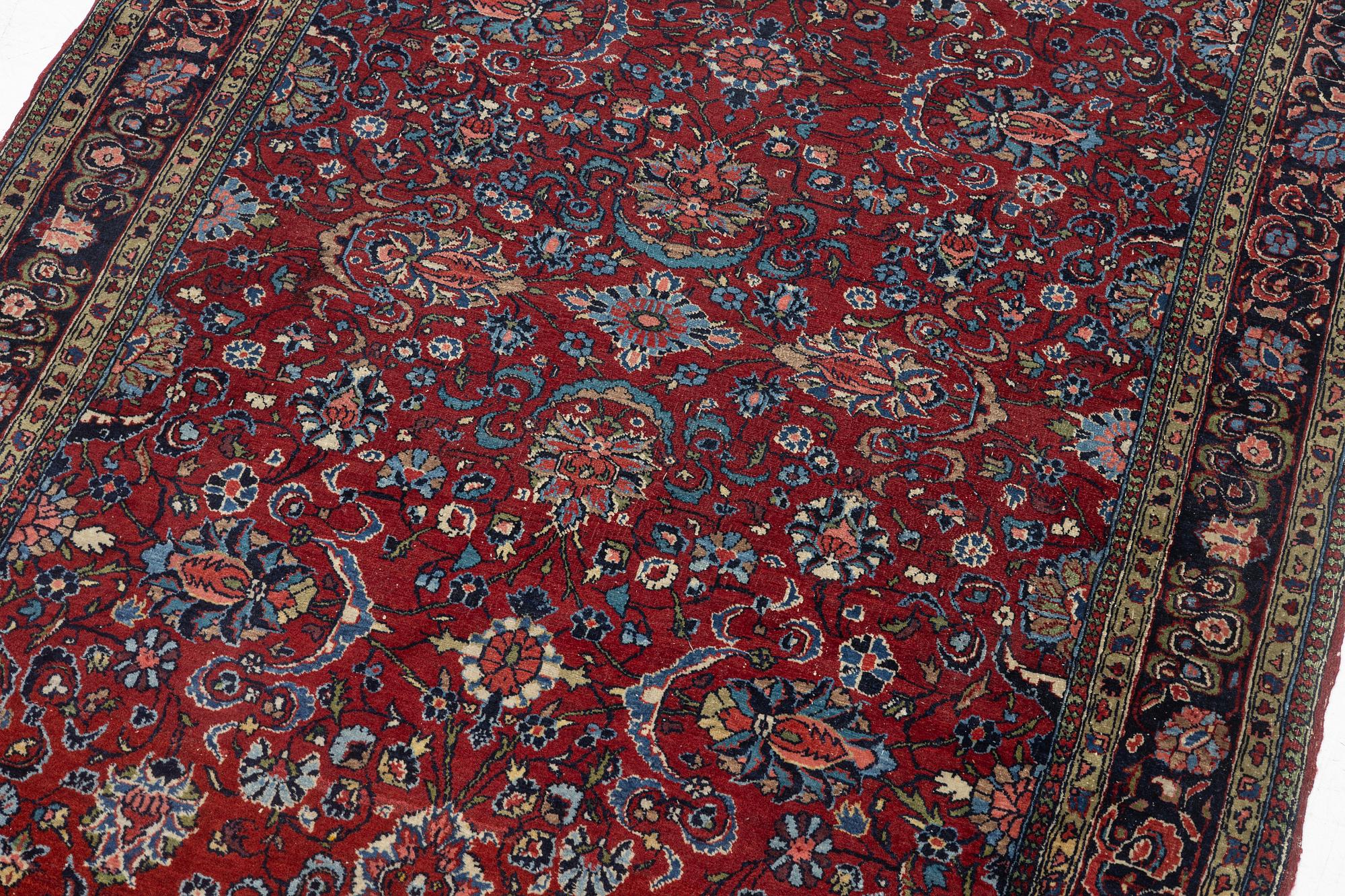 A Kashan rug, c. 208 x 138 cm.
