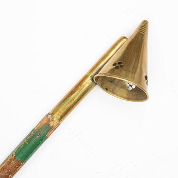 A 19th century brass candle snuffer.