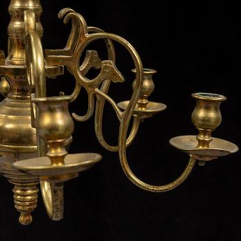 A brass baroque style chandelier, 19th century.