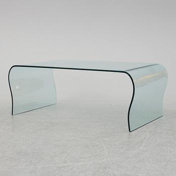 A mid 20th Century glass coffee table.
