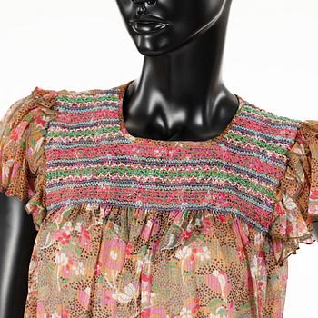 ANNA SUI, a silk dress.