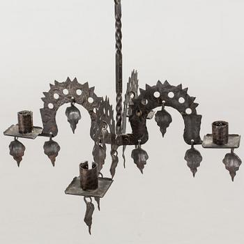 A FOLKLORE LAMP 20TH CENTURY.