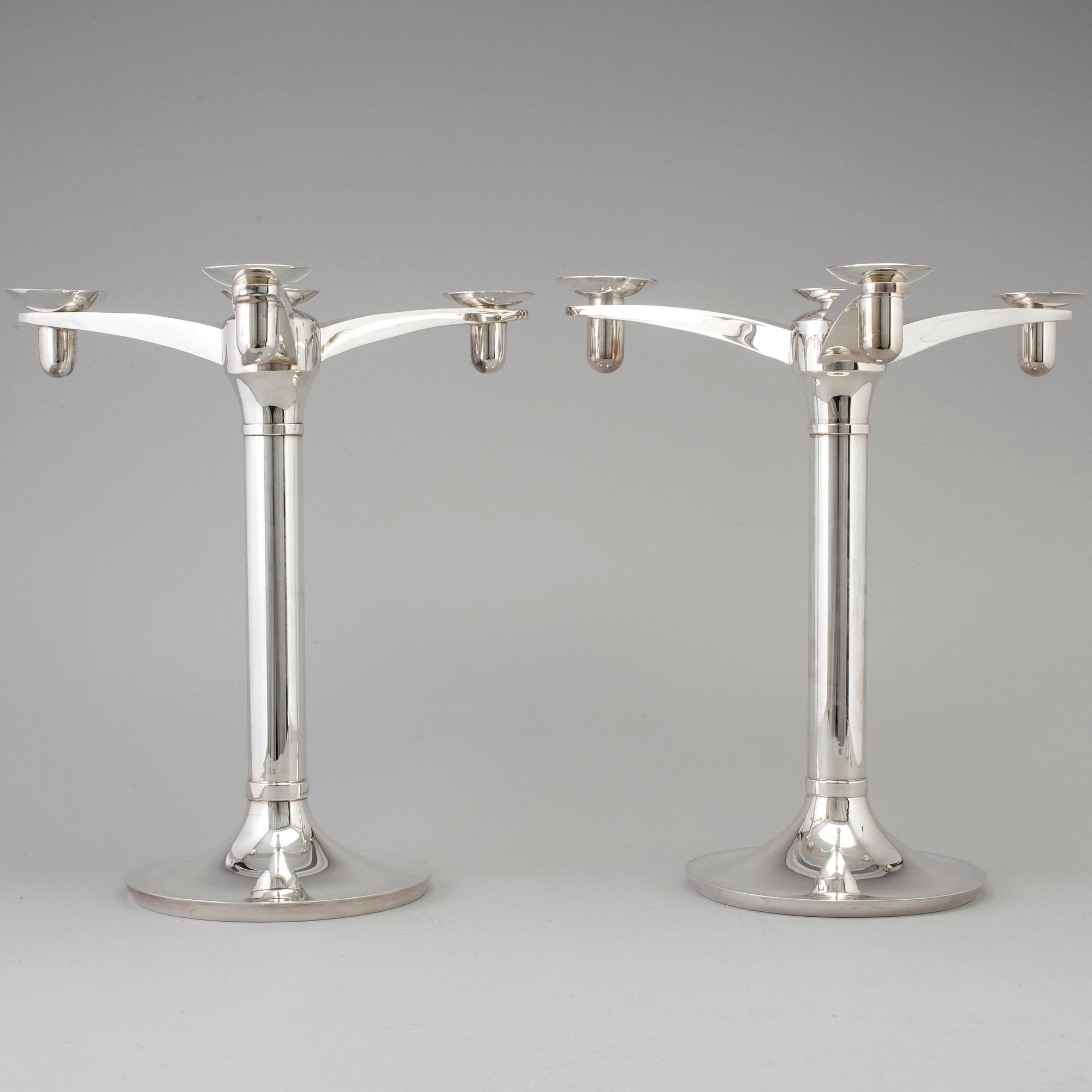 RICHARD FOX, a pair of three armed, four light sterling candelabra, London, 2001 and 2013.