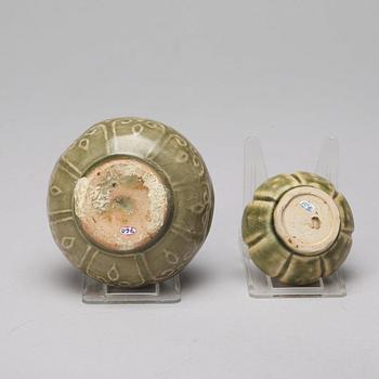 Two olive green glazed jars and a dish, South East Asia, 14th/15th Century.