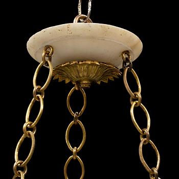 An Empire alabaster lamp, early 19th Century.