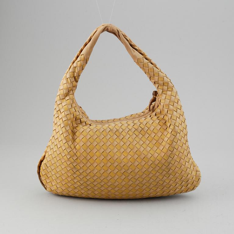 Bottega Veneta, a leather bag.