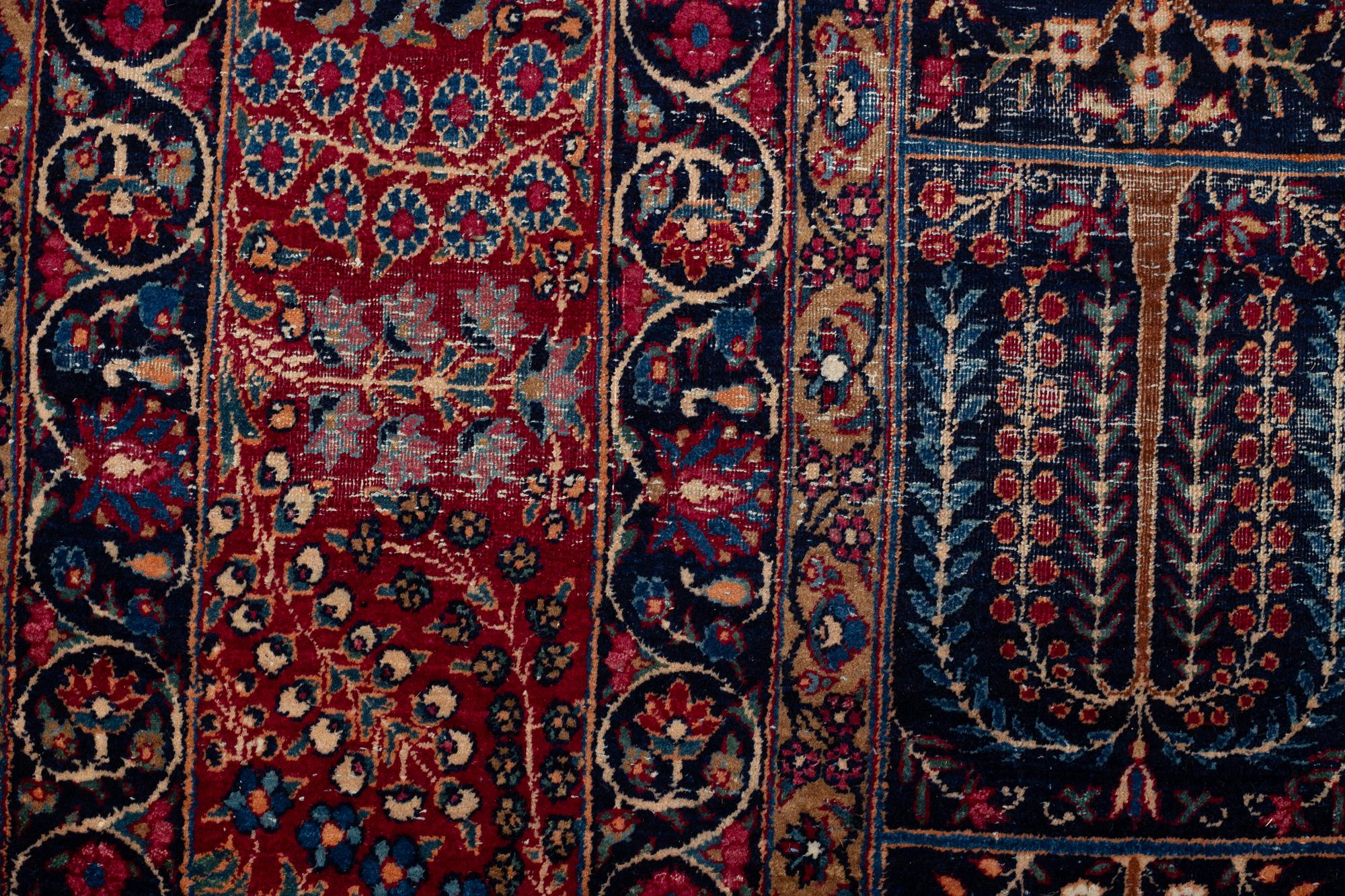 A carpet, an antique/a semi-antique Yezd, ca 557-562 x 366,5-370,5 cm.